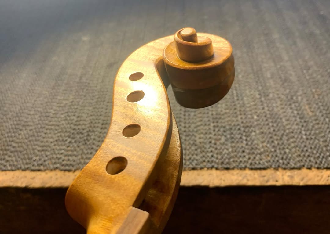 First varnish layer application